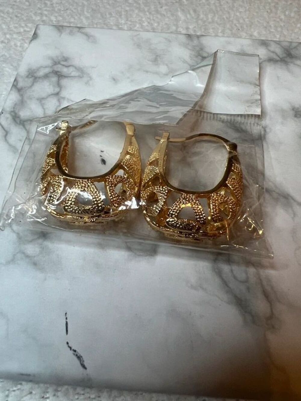 Gold tone earrings